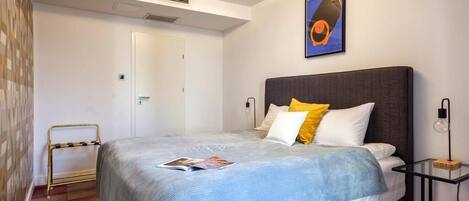 Laptop workspace, blackout drapes, soundproofing, iron/ironing board