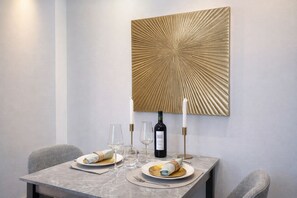 Premium Apartment, Courtyard View | Living area | 80-cm Smart TV with digital channels