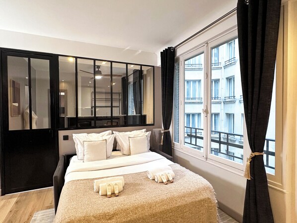 Premium Apartment, Courtyard View | Living area | 80-cm Smart TV with digital channels