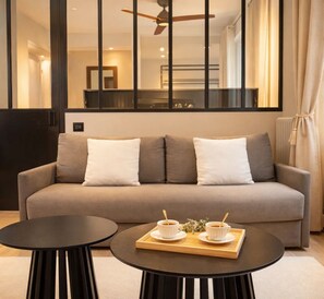 Premium Apartment, Courtyard View | Living area | 80-cm Smart TV with digital channels - 1628 Matignon (Paris)