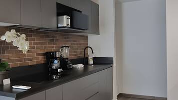 Fridge, microwave, cookware/dishes/utensils