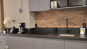 Fridge, microwave, coffee/tea maker, toaster