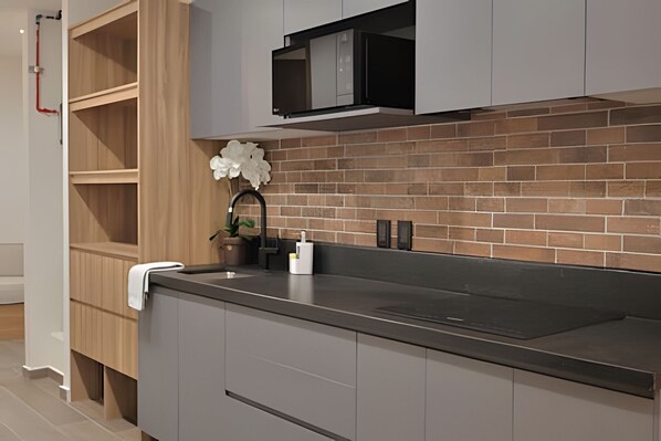 Fridge, microwave, coffee/tea maker, toaster