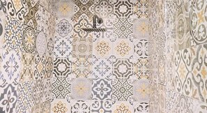 Shower, hair dryer, towels, shampoo