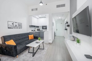TV - StayShort - Outstanding Studio in JVC with Balcony! (Jumeirah Village Circle)