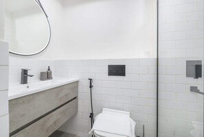 Shower, hair dryer, towels - Free housekeeping visits during your stay - StayShort - Chic Balcony Studio in the Heart of JVC! (Jumeirah Village Circle)