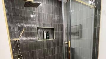 Shower, hair dryer, towels, soap