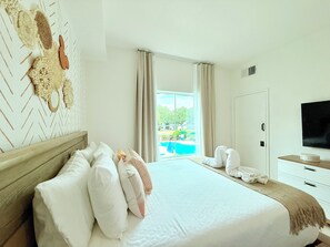 1 bedroom, desk, iron/ironing board, travel crib