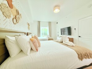 1 bedroom, desk, iron/ironing board, travel cot