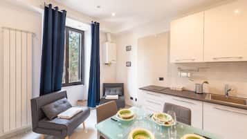 Apartment (1 Bedroom) | Living area | TV