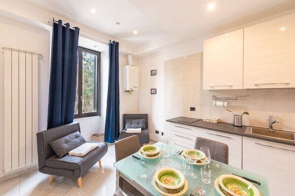 Apartment (1 Bedroom) | Living area | TV