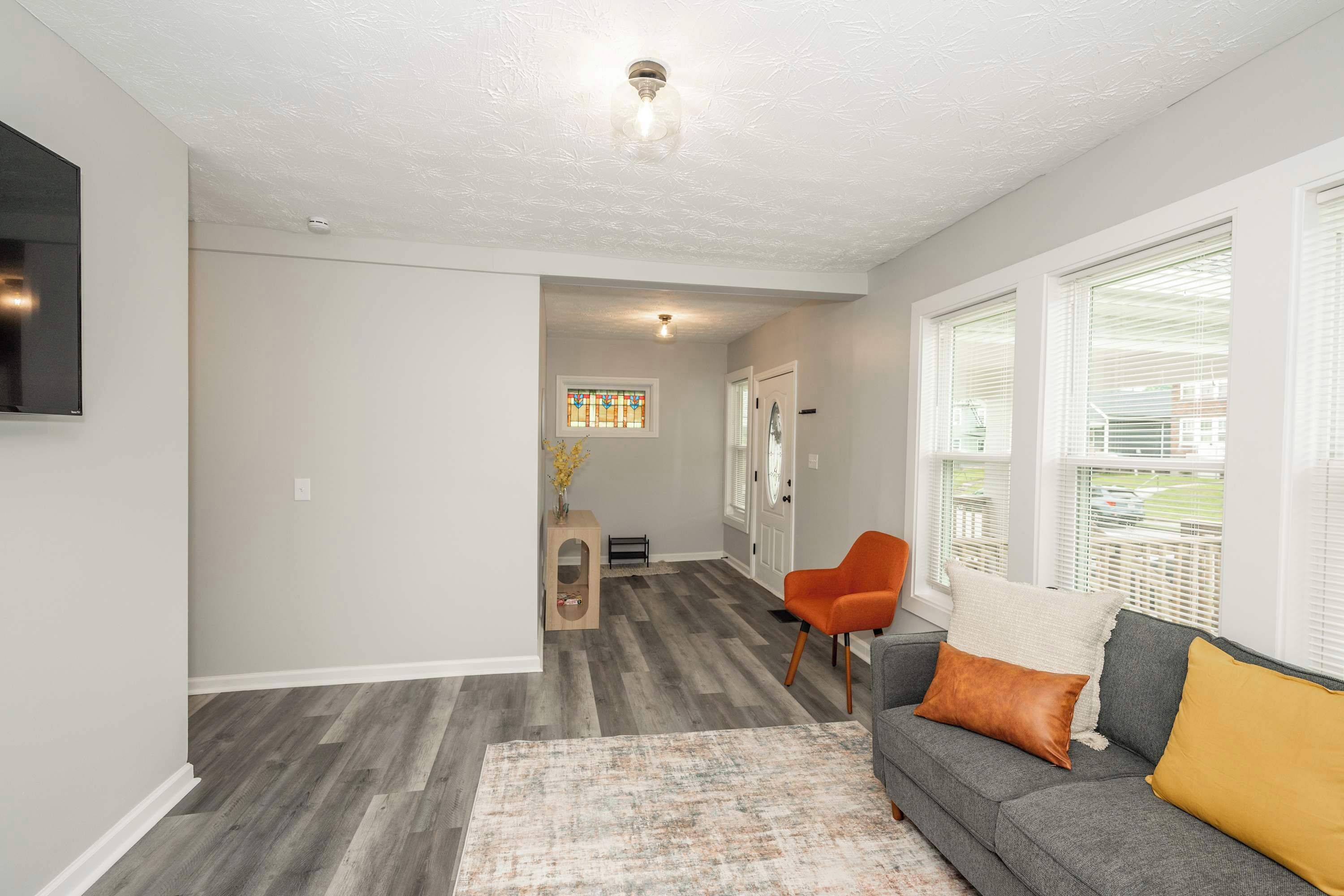 House, Multiple Beds, Patio, Garden View (Modern Cincy Home) | Living area | 42-inch flat-screen TV with digital channels