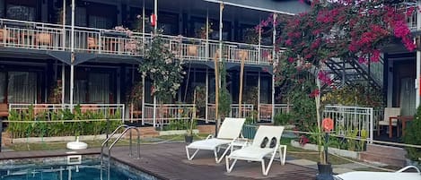 Family Studio Suite, Patio | Desk, laptop workspace, free WiFi