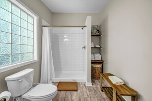 Shower, eco-friendly toiletries, hair dryer, towels