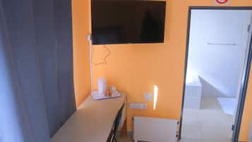 Double or Twin Room, City View | Desk, laptop workspace, iron/ironing board, free WiFi