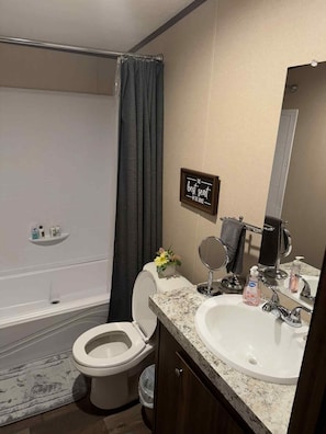 Hair dryer, towels, soap, toilet paper