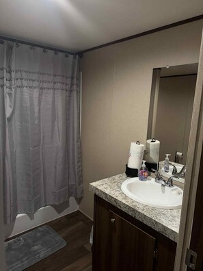 Hair dryer, towels, soap, toilet paper