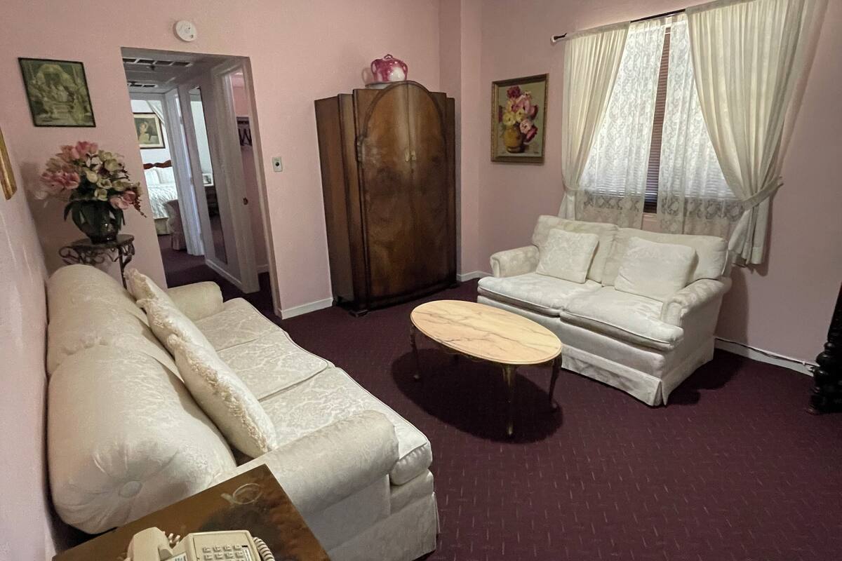Superior Suite, 1 King Bed, Non Smoking, Kitchenette | Living room | 35-inch Smart TV with cable channels