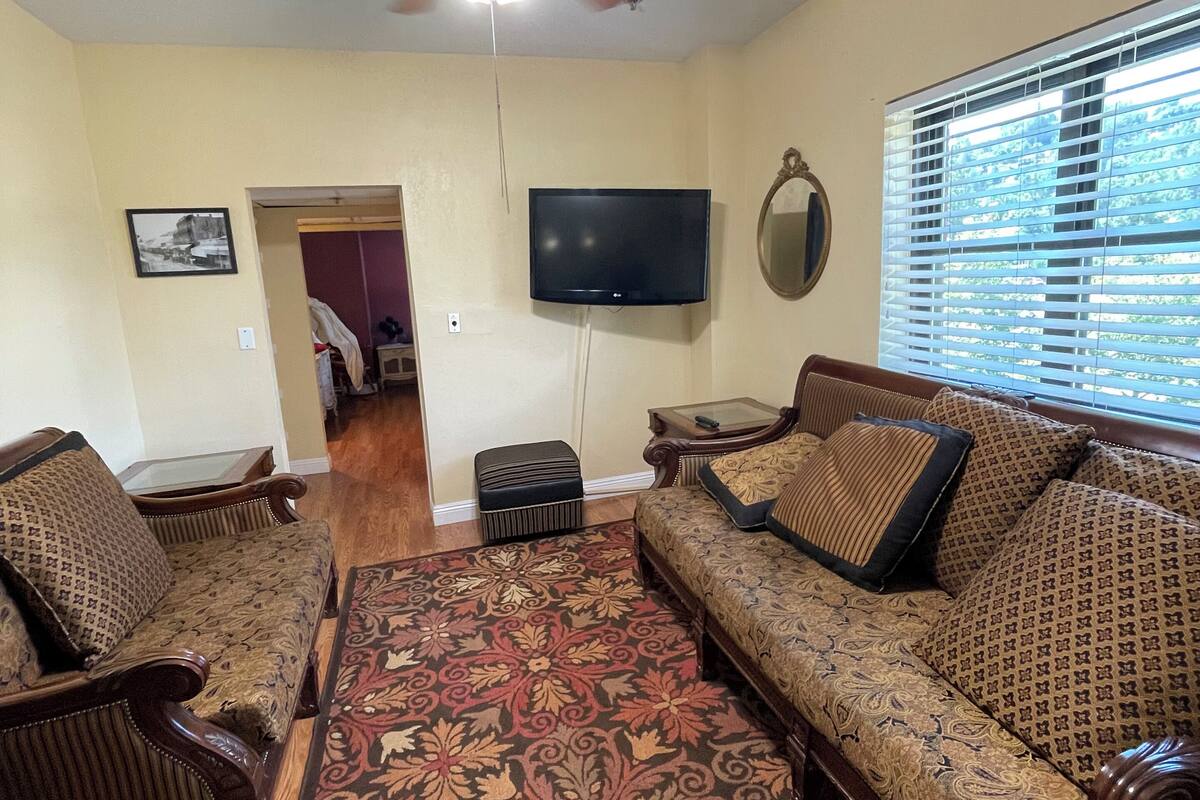 Superior Suite, 1 Queen Bed, Non Smoking, Kitchenette | Living room | 35-inch Smart TV with cable channels