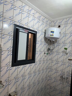 Shower, bidet, towels, soap