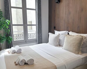 Apartemen Standar, pemandangan halaman | Setrika/meja setrika, tempat tidur bayi, Wi-Fi gratis, dan seprai linen