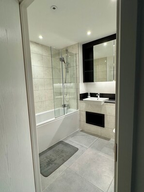 Hair dryer, towels, soap, toilet paper