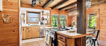 Riverfront Cabin with Heated Pool, Cedar Hot Tub, Sauna and Dock