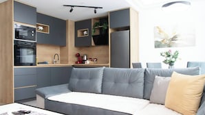 Appartement, 2 chambres, accessible aux personnes à mobilité réduite, vue jardin | Salle de séjour