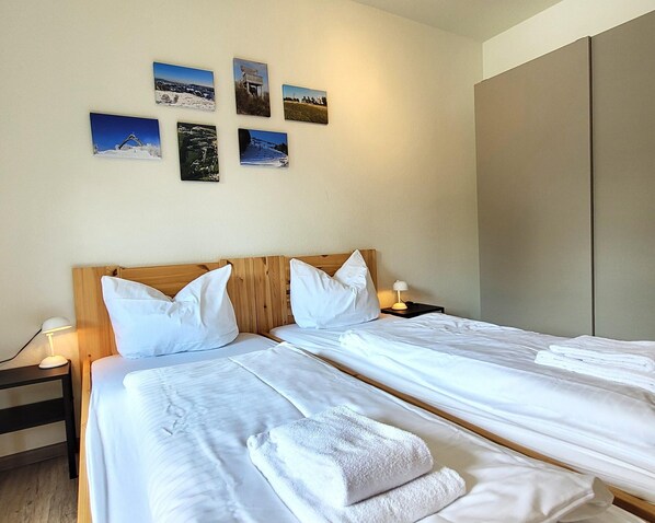 Apartamento | 2 quartos, roupa de cama