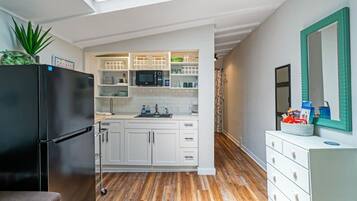 Fridge, microwave, coffee/tea maker, toaster