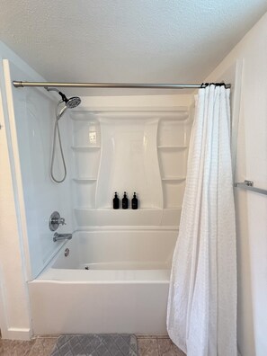 Hair dryer, towels, soap, shampoo