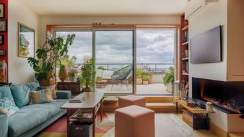 Apartamento Confort, vistas a la ciudad | Zona de estar