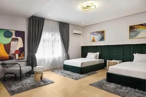 Family Room, Balcony, City View | Desk, laptop workspace, blackout curtains, soundproofing