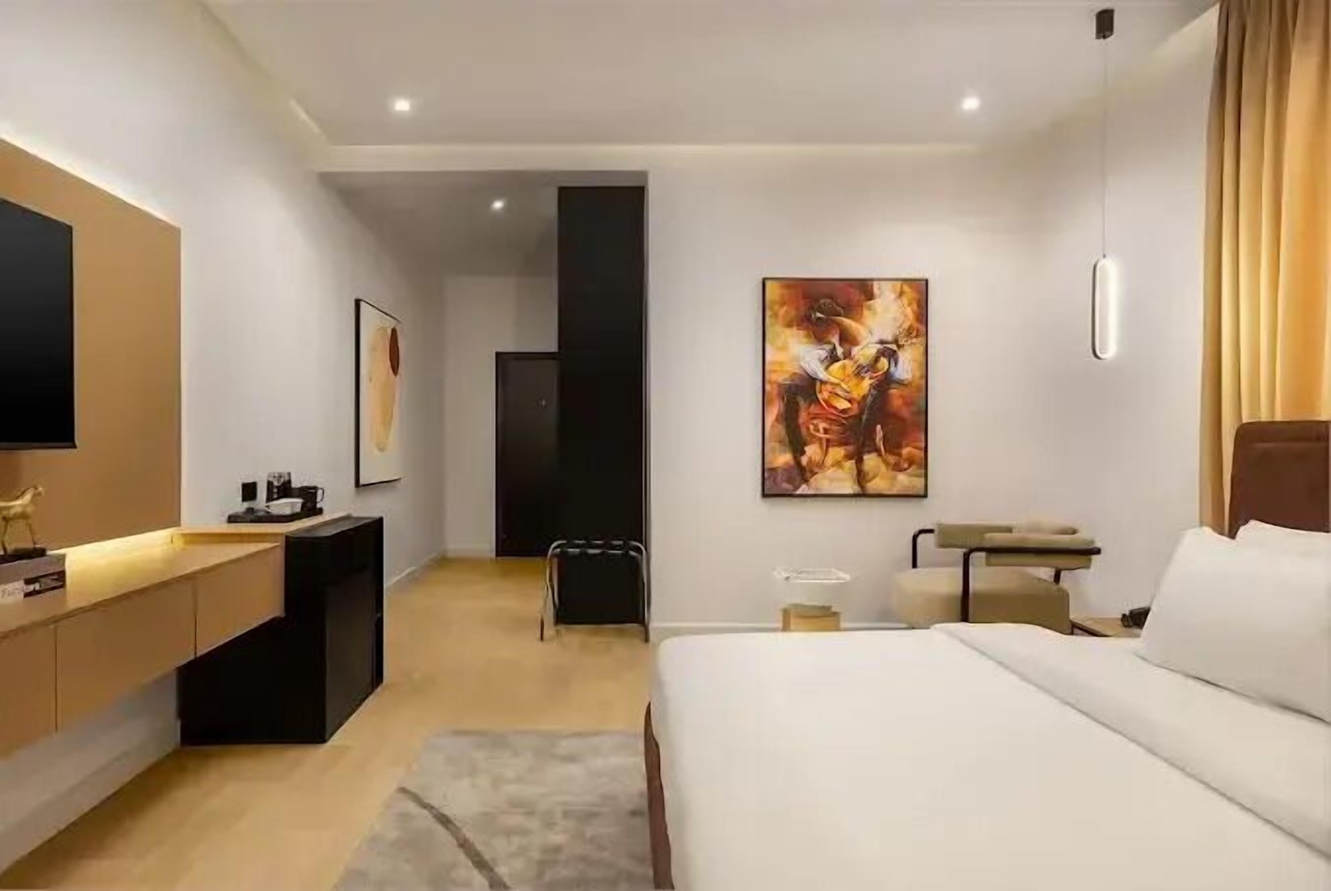 Family Room, Balcony, City View | Desk, laptop workspace, blackout drapes, soundproofing