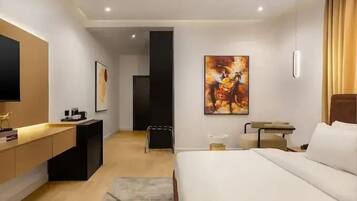 Family Room, Balcony, City View | Desk, laptop workspace, blackout drapes, soundproofing