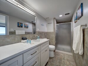 Shower, hair dryer, towels, soap