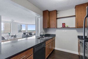 Fridge, stovetop, coffee/tea maker, cookware/dishes/utensils