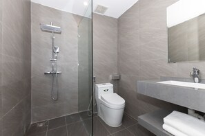 Shower, free toiletries, hair dryer, slippers