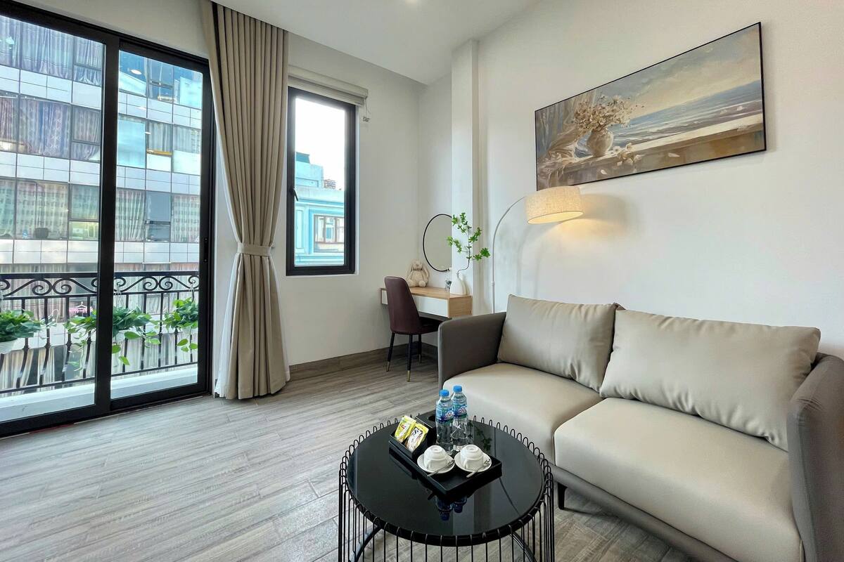 Habitación Deluxe, 1 cama de matrimonio, vistas a la ciudad | Zona de estar