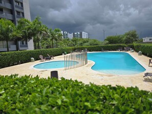 Outdoor pool - Modern 3BR Apartment w/ Pool View & Smart Lock — 7 Min from Santiago Airport (Santiago de los Caballeros)