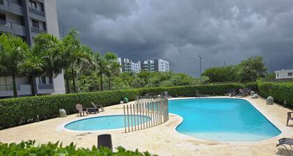 Modern 3BR Apartment w/ Pool View & Smart Lock — 7 Min from Santiago Airport