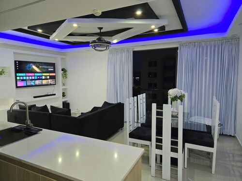 Modern 3BR Apartment w/ Pool View & Smart Lock — 7 Min from Santiago Airport
