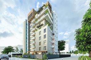 Exterior - Charming 1BR Suite | Rooftop Pool | Scenic City Views (Accra)