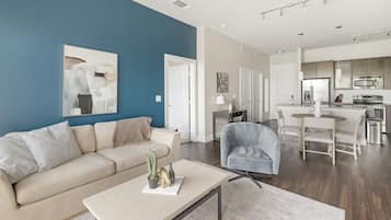Apartment, 2 Bedrooms | Living area | 50-inch Smart TV with digital channels