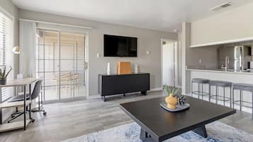 Apartment, 1 Bedroom | Living area | 50-inch Smart TV with digital channels