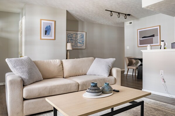 Apartment, 1 Bedroom | Living area | 50-inch Smart TV with digital channels