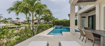 Stunning 5BR Waterfront Oasis With Heated Pool, Spa