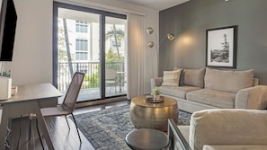 Apartment, 2 Bedrooms | Living area | 50-inch Smart TV with digital channels