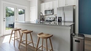 Apartment, 3 Bedrooms | Private kitchen | Microwave, oven, stovetop, dishwasher