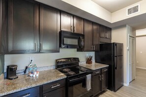 Apartment, 2 Bedrooms | Private kitchen | Microwave, oven, stovetop, dishwasher
